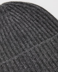 Close-up of the White + Warren Cashmere Plush Rib Beanie in Dark Slate Heather, highlighting its textured and cozy ribbed knit—perfect for cold weather.