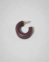 The B&L C Hoop in Mini Hoop Cocoa is a single dark maroon chunky hoop earring, handmade from sustainably sourced mango wood with a gold post, shown on a plain white background.