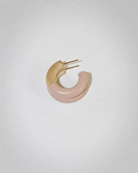 The B&L Mini Dip Hoop in Mulberry is a single round hoop earring with a half-gold, half-pale pink design, crafted from sustainably sourced materials and shown on a plain white background.