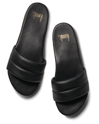 The beek.. Sugarbird in Black sandals feature wide padded leather straps, a molded footbed, memory foam sole, and gold beek.. branding on the insoles, shown here against a white background.