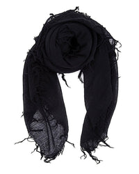 The Chan Luu Cashmere & Silk Scarf in Black features a crinkled texture and frayed edges, styled loosely rolled with the ends hanging down.
