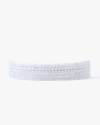 Chan Luu's CL Blue Lace Agate & SS Wrap Bracelet features five translucent, round white beaded bracelets, some with blue lace agate accents, arranged in a neat row on a plain white background.