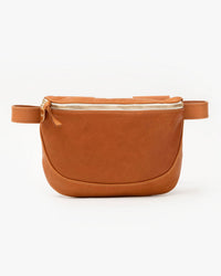 Clare V.'s Fanny Pack in Tan Neptune is a minimalist tan leather bag with an adjustable belt and zippered top closure, shown against a plain white background.