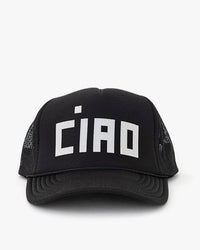 The Clare V. Trucker Hat - Block Ciao - Black features bold white "CIAO" block letters on the front, mesh sides, and a snap-back closure.