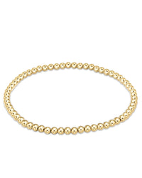 The enewton Classic Gold 3mm Bead Bracelet features small, round, polished beads in a continuous loop, crafted with high-quality 14k gold-filled material.