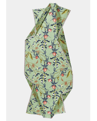 The Meadow Orchids Scarf in Verde by Épice features green fabric with orange and blue floral motifs, green leaves, and geometric branches on light gray—ideal as a scarf or handwoven stole.