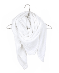 The Freedom Scarf in Salt by It is well LA, a soft white gauze scarf, is draped over a metallic hanger against a plain white background.