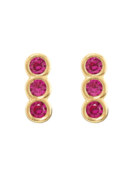 The Kris Nations Triple Bezel Crystal Stud Earrings in Gold & Ruby feature three vertically aligned ruby cubic zirconia stones set in 18k gold vermeil bezel settings.