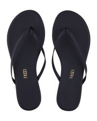 A pair of Tkees Liners Flip Flops in Twilight with thin straps, seen from above on a white background.