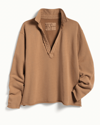 The Patrick Henley in Camel Terry by Frank & Eileen is a long-sleeve, light brown French Terry pullover with a deep V-neck and raw edges, shown against a white background. The soft, textured fabric reflects the brand's signature style.