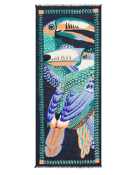 The Scarf 70 Toucan in Emerald by Inoui Editions is a vibrant rectangular wool scarf with three stylized toucans in blue, teal, orange, and white feathers, framed by a geometric green and blue leaf border.
