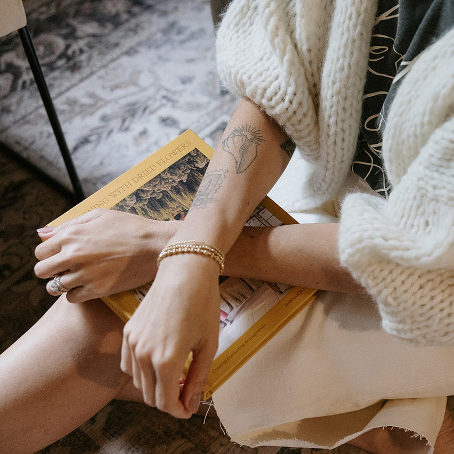 enewton jewelry bracelet on a woman's arm