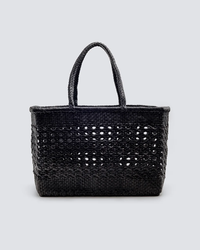 Cannage Max in Black Dragon Diffusion handwoven leather tote bag on a neutral background.