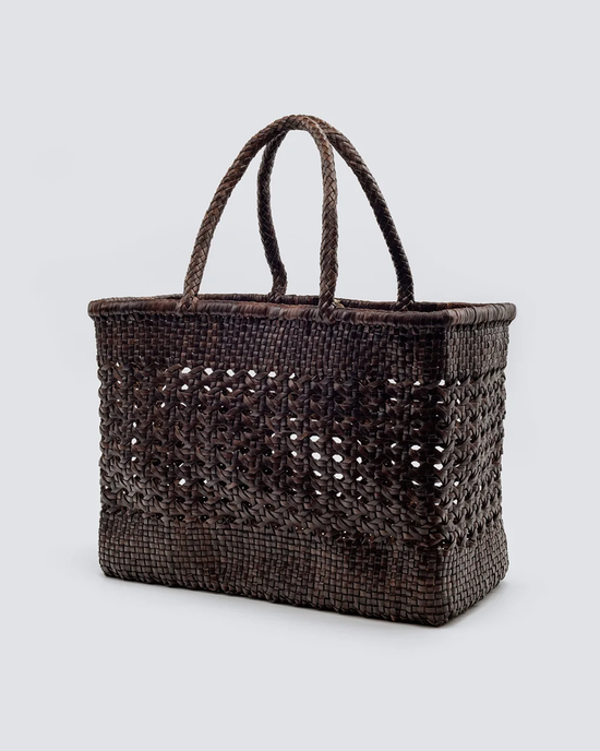 Handwoven leather Cannage Max tote bag in Dark Brown by Dragon Diffusion with double handles.