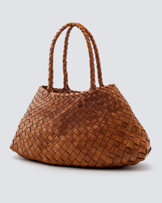 Brown woven Dragon Diffusion Santa Croce Bag Big in Tan leather handbag against a neutral background.
