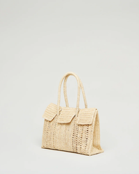 Dahlia Mini Bag in Natural by Maison N.H Paris with dual handles and front flap pocket, against a plain light background.