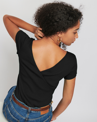 Woman from behind wearing a Jet Black Quinn Wrap Tee in organic Pima cotton and denim jeans by Nation LTD.