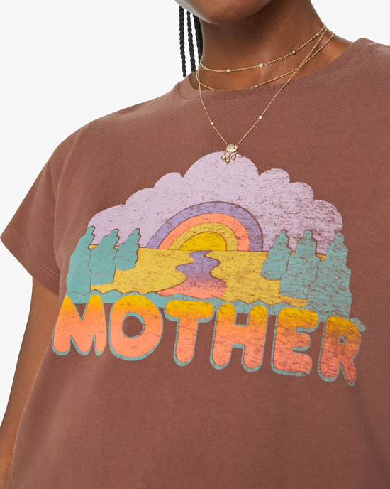 Woman wearing a brown, Boxy Goodie Goodie t-shirt in Mother Sunset by Mother.
