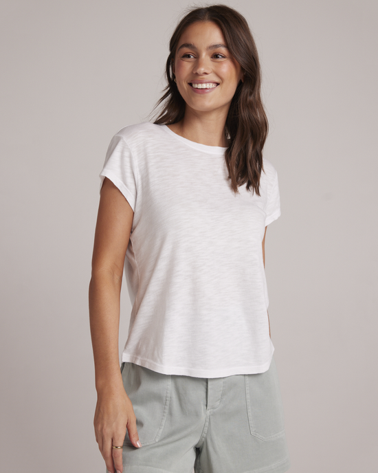 Woman in a Bella Dahl cotton/modal blend white Baby Crew Tee smiling at the camera.