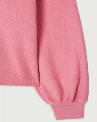 Close-up of a pink American Vintage Boby Park L/S Crew in Tendresse Chine with a ribbed cuff.