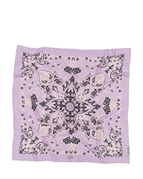 The Classic Cotton Bandana in Lilas by Maison Lecomte Flament is a lavender square featuring an intricate black and white floral and paisley design.