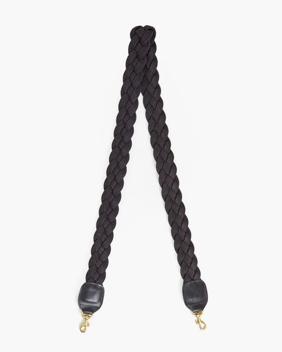 A Clare V. braided rope crossbody strap in black with metal clasps.