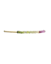 A 2MM Sig Bracelet with Vino Ombre & Yellow Gold designed by Karen Lazar featuring a color gradient ranging from gold through shades of green to purple.