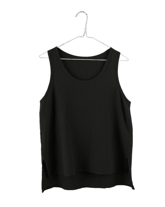 Sleeveless Gauze Top in Black from It is well LA on a hanger against a white background.