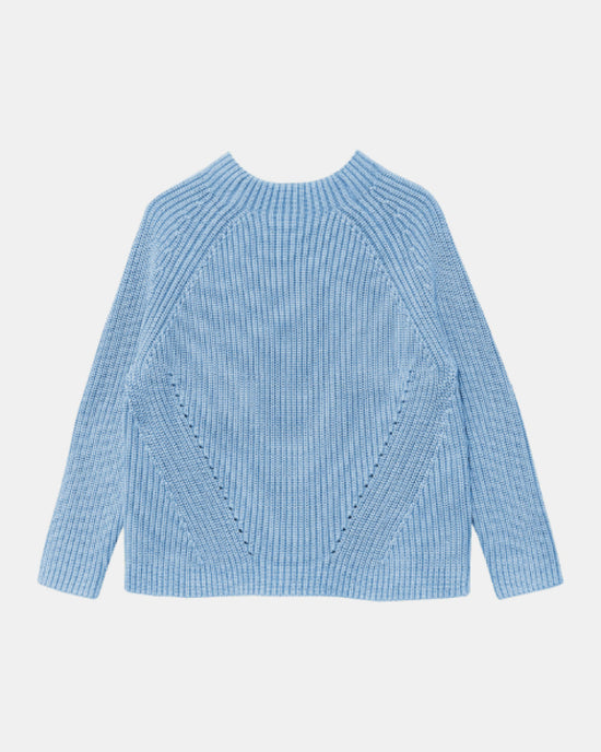The Demylee Daphne Washed Cotton Sweater in Sky Blue is a light blue, long-sleeve ribbed knit with a boxy fit, crew neckline, and diagonal front ribbed details. Sweater is shown laid flat on a white background.