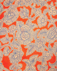 The Loren Blouse in Vermillion Vine by Trovata Birds of Paradis showcases an orange fabric with white and light blue floral patterns, ideal for a stylish puff sleeve look in 100% cotton.