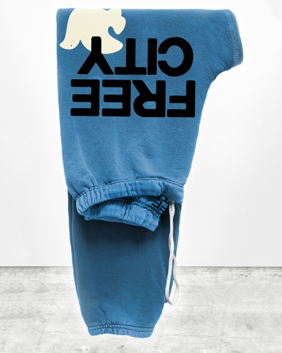 Blue Free City Large Sweatpant in Blue Sound with a reversed "olke" logo displayed against a plain background.