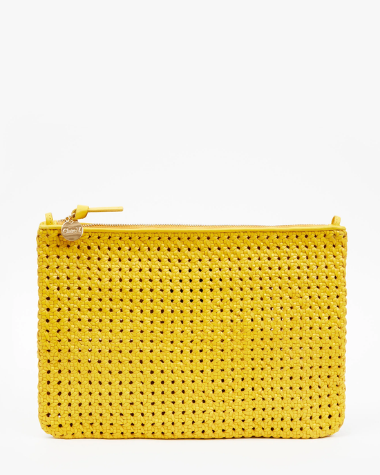 Bright yellow Flat Clutch w/ Tabs in Dandelion Rattan by Clare V., with a zipper, isolated on a white background.