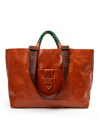 Large brown Clare V. Italian leather tote bag with green beaded handles and a small front pocket, displayed against a white background.