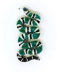 Hand-embroidered Trovelore Green Banded Snake Brooch Pin with green, white, and black patterns on a white background.