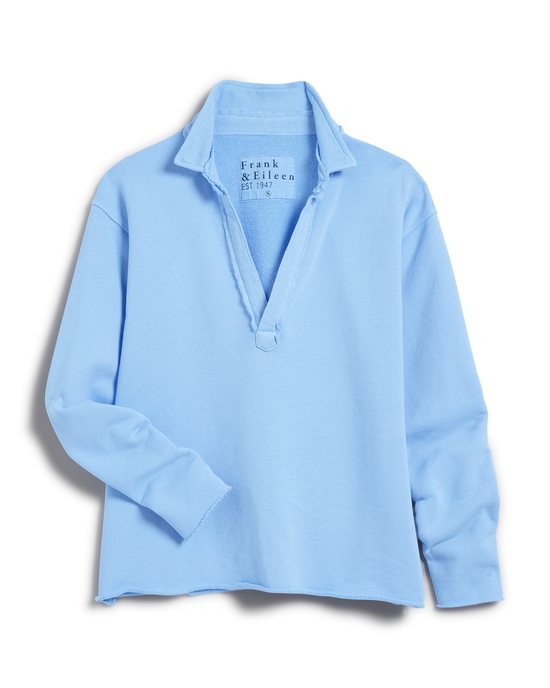 A light blue, long-sleeve Patrick Popover Henley in Saltwater French Terry shirt with an open collar, displayed on a white background by Frank & Eileen.