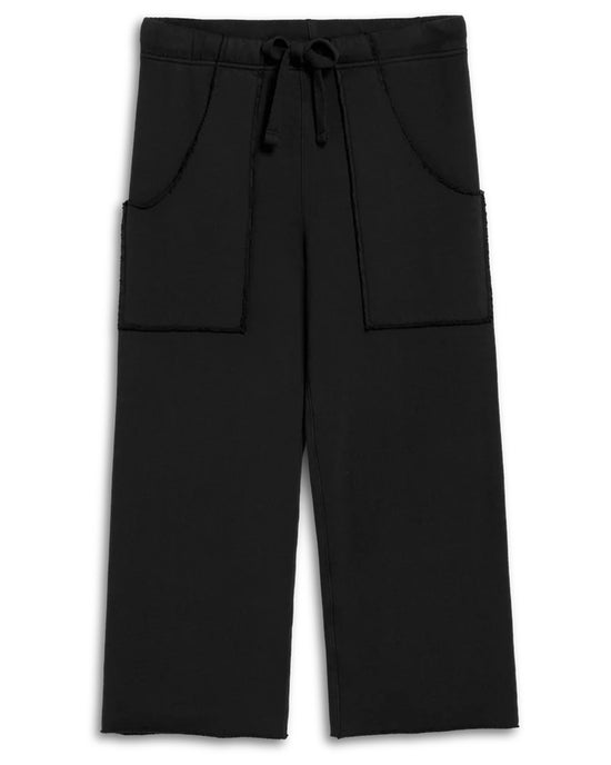Frank & Eileens Penny Patch Pocket Sweatpant in Black features a relaxed, cropped wide-leg fit, elastic drawstring waist, large front patch pockets, and raw hem—perfect for effortless, everyday comfort.