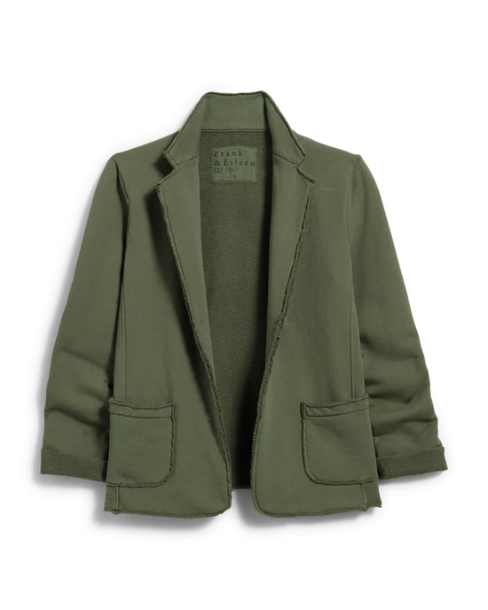 The Dublin Knit Blazer in Caper by Frank & Eileen features triple fleece for comfort, a notched lapel, two front pockets, raw edges, and rolled-up sleeves for a relaxed look.