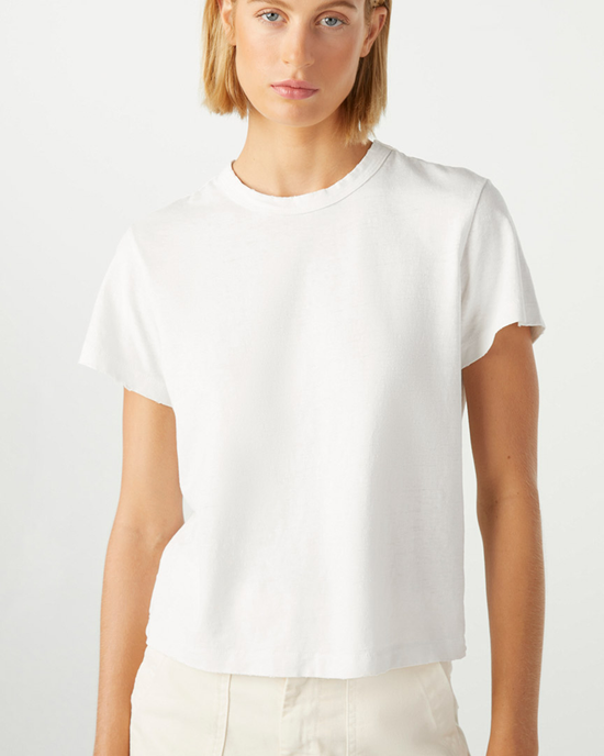 Woman wearing a Love Tee in White by AMO.