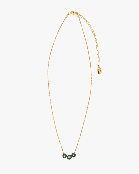 Clare V. Gold necklace with a green gemstone pendant and adjustable 14k gold plated brass chain clasp.