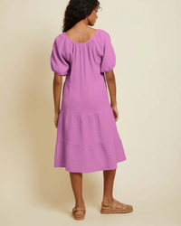 Woman wearing the Mindy Peasant Dress in Prom Date by Nation LTD, viewed from behind.