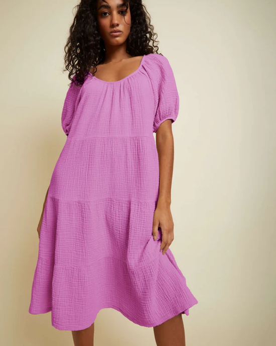 Woman posing in a purple Double Gauze Prom Date Mindy Peasant Dress by Nation LTD.