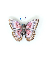 A handmade embroidery representation of a Morpho Godarti Butterfly Brooch Pin with patterned wings and antennae resembling pins by Trovelore.