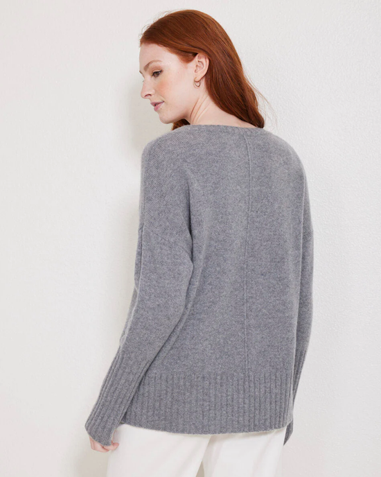Woman wearing a Storm Grey Ella V Neck sweater from Not Monday viewed from behind.