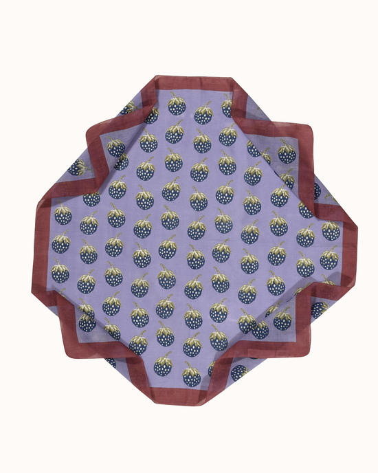 Hexagon-shaped, 100% Cotton cloth with a Épice Botanica Strawberries Bandana in Lavender pattern on a white background.