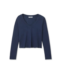 The perfectwhitetee Fiona Long Sleeve Recycled V Neck in Navy features a cropped fit and V neckline, made from recycled cotton, shown laid flat on a white background.