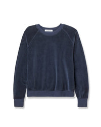 The Stella Velour Shrunken Raglan SS in Navy by perfectwhitetee is a luxe velour sweatshirt with a relaxed silhouette and crew neck, shown flat against a white background.