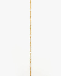 The Clare V. Fine Paperclip Charm Chain 24" in 14K Gold Vermeil features elongated oval and small round links, shown vertically on a plain white background.