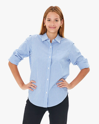 Woman posing in a tailored fit Clare V. Phoebe Blouse in Blue & Cream Stripe made of cotton poplin, with blue and white stripes and hands on hips.