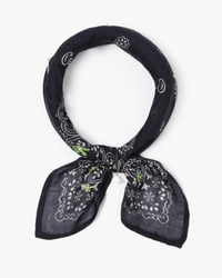Black Floral Bandana in Black with paisley design tied in a knot, isolated on a white background by Chan Luu.