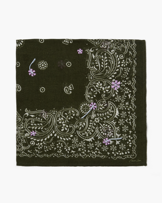 Chan Luu Floral Bandana in Rifle Green with white and purple paisley patterns.